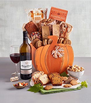 pumpkin basket with baked goods and wine